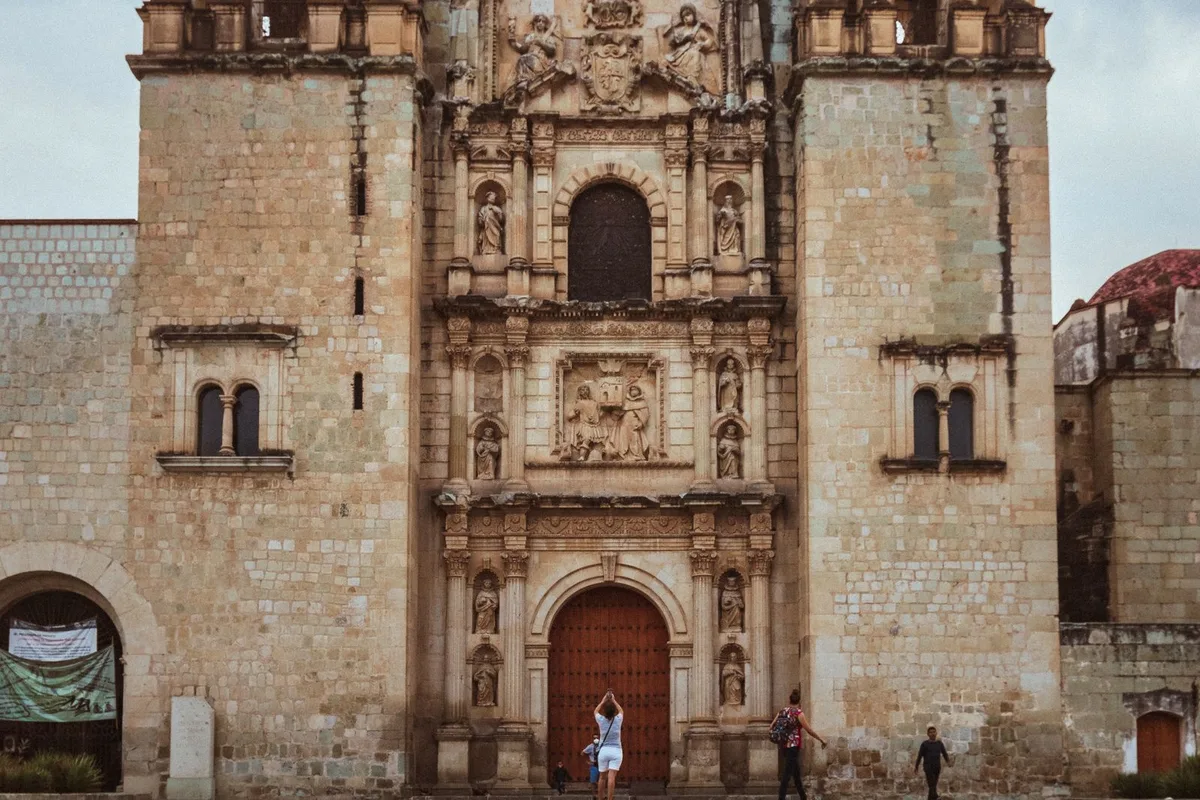 The carved stone facade of Santo Domingo de Guzmán church, Oaxaca