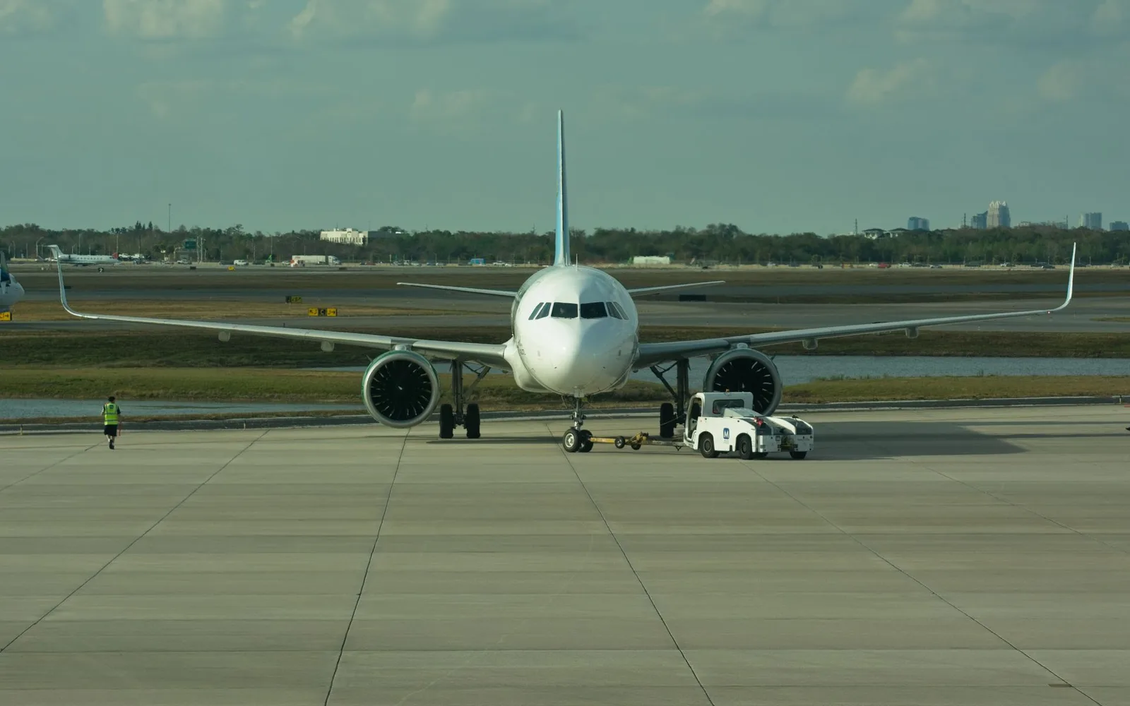 A jet being pushed back at Orlando International Airport