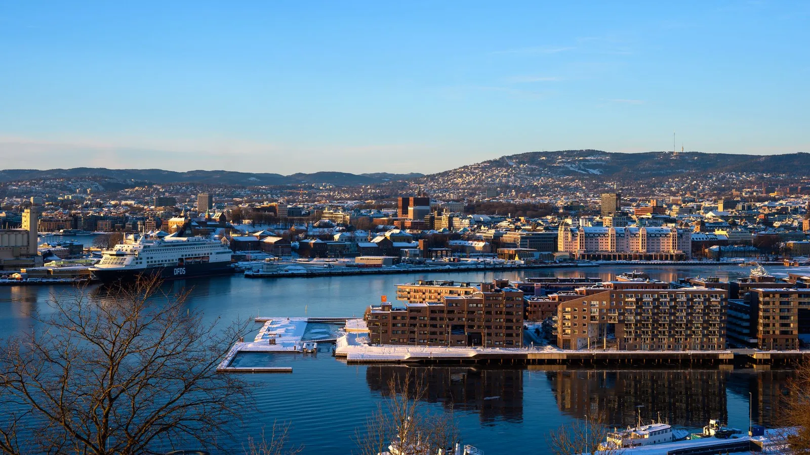 Snow-covered Oslo and the fjord in winter sun