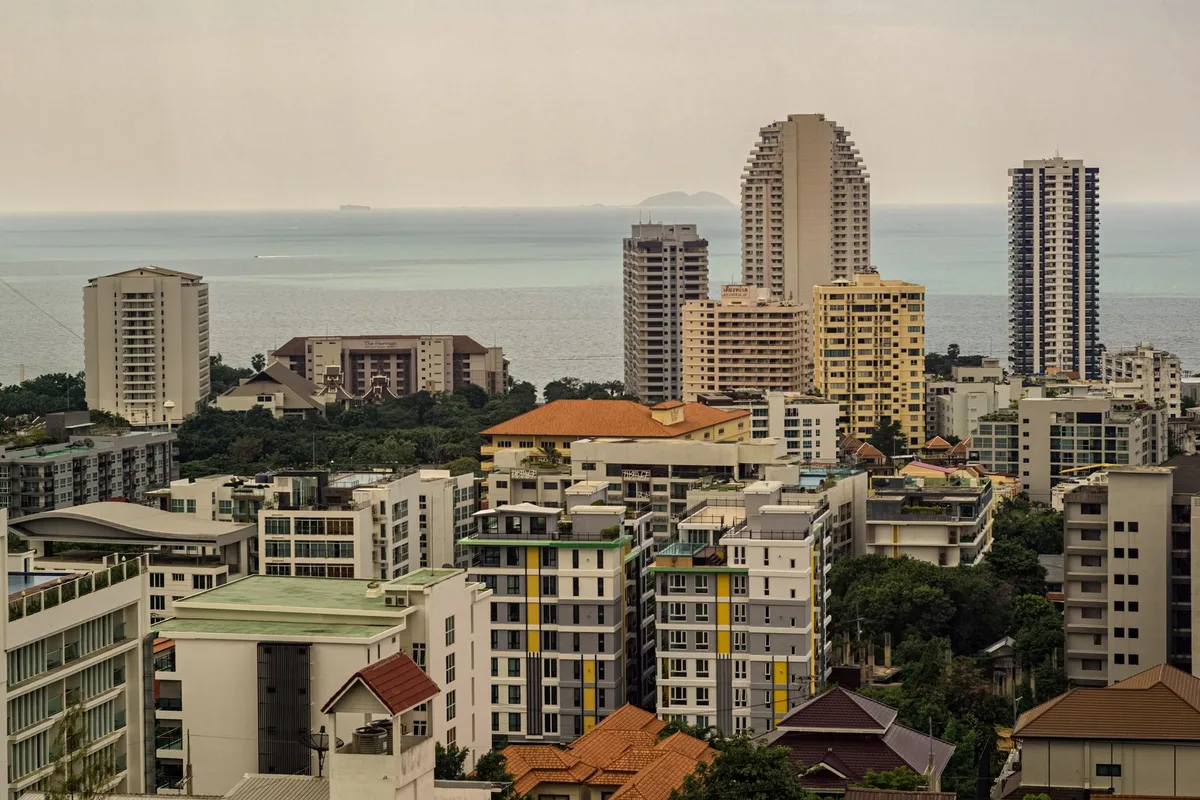 Condo towers above Pattaya Bay from Pratumnak Hill, Koh Larn on the horizon