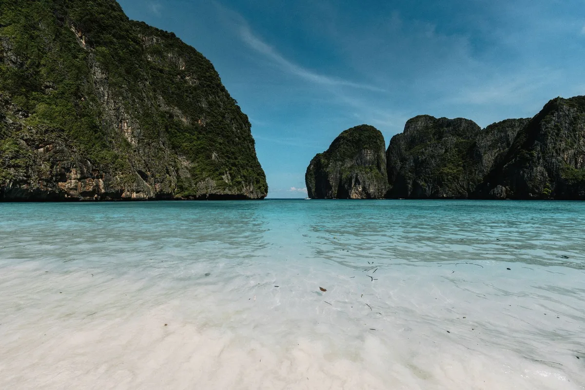 Maya Bay on Phi Phi Leh, white sand under limestone cliffs