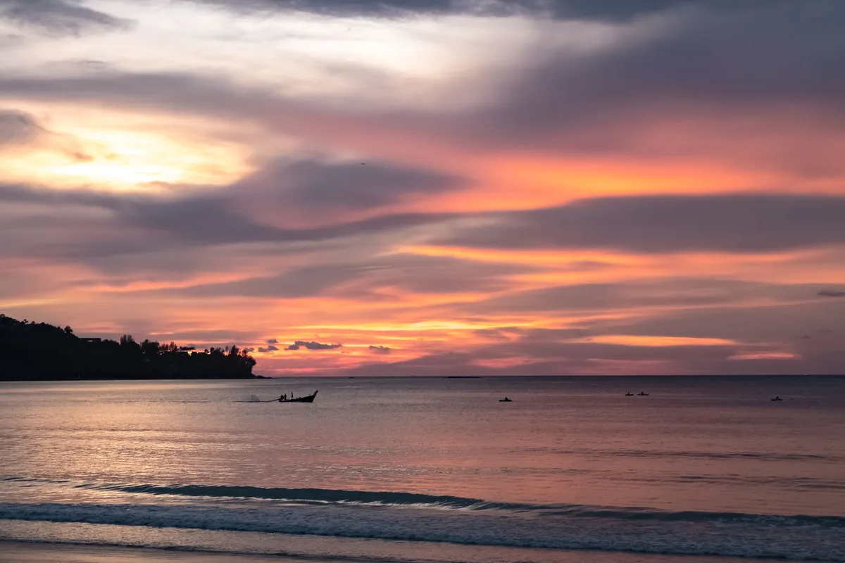 Sunset over the Andaman Sea from a Phuket west-coast beach