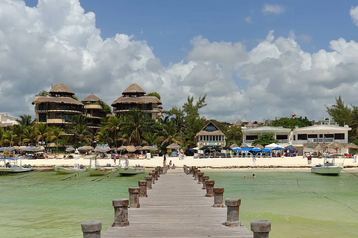 The pier and turquoise sea at Playa del Carmen