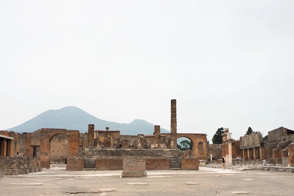 The Forum at Pompeii, with Mount Vesuvius rising behind the ruins