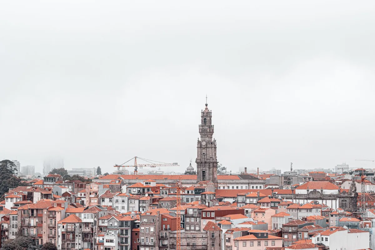 The Clérigos Tower rising above Porto's old town rooftops
