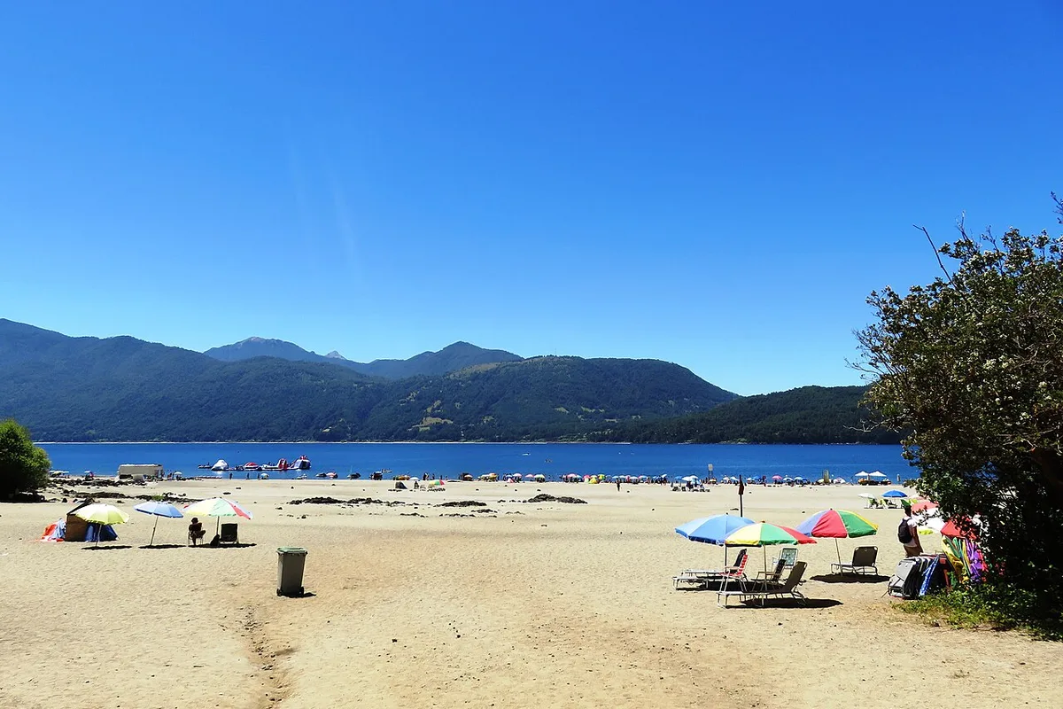 The black-sand beach at Lake Caburgua, near Pucón