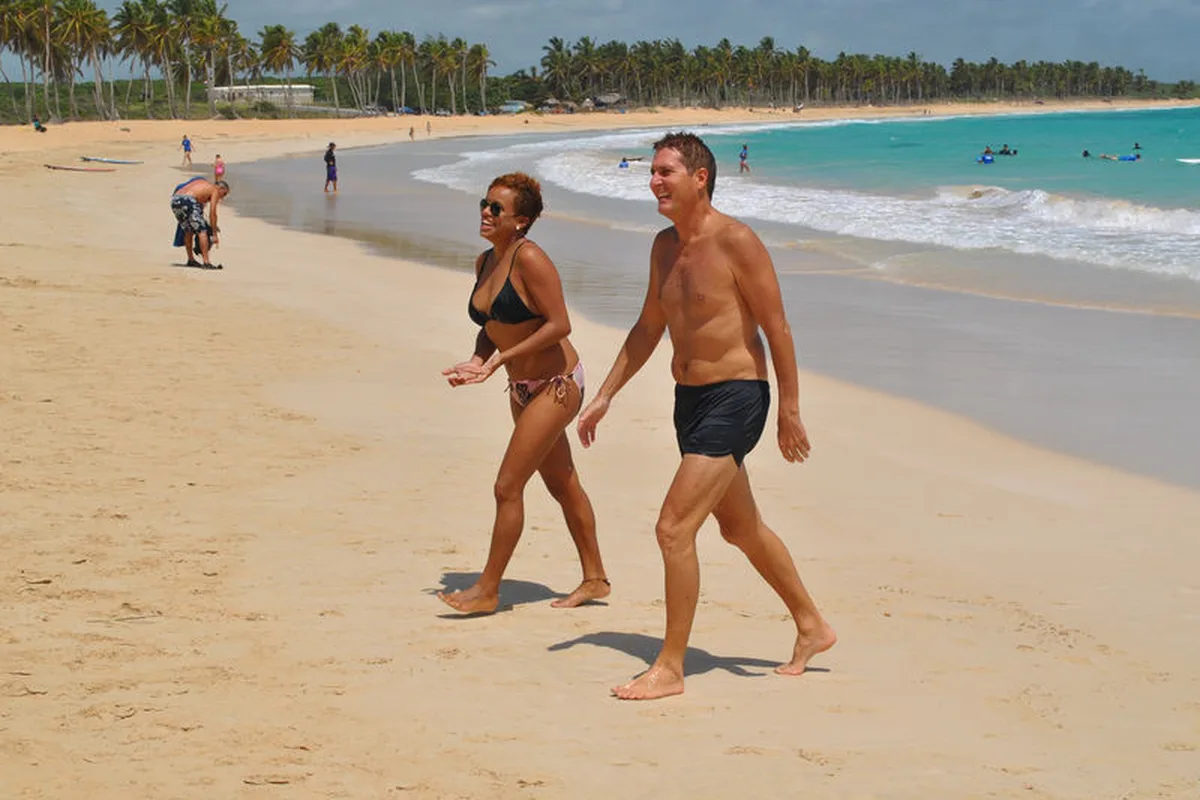 Macao Beach, the wide public beach north of Bávaro, with palms and surf