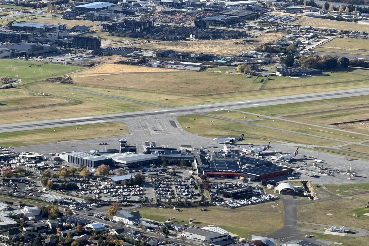 Queenstown Airport from the air, the runway and terminal beside Frankton