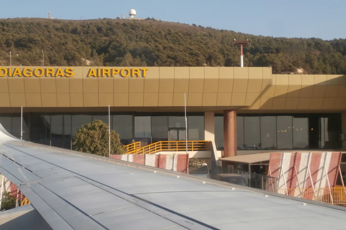 Diagoras International Airport terminal at Rhodes with an Aegean aircraft at the stand