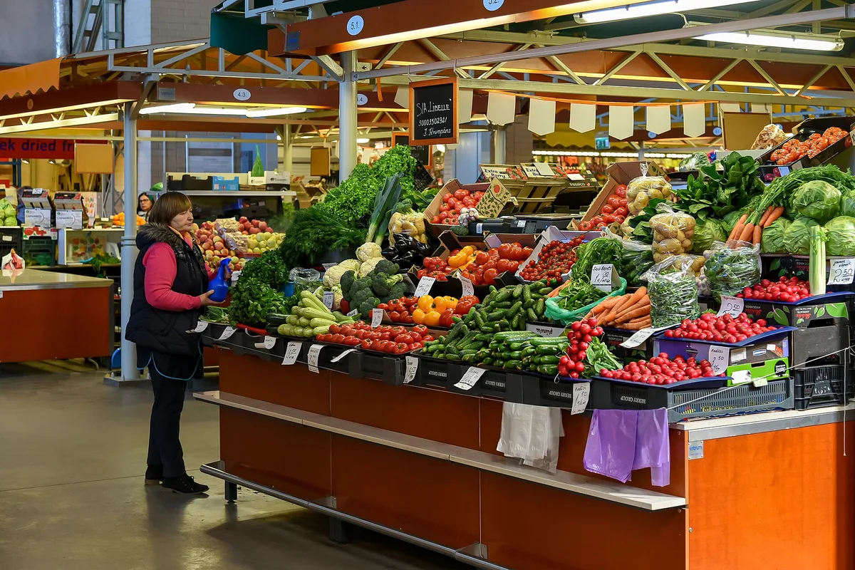 A vegetable stall inside Riga Central Market, one of the five Zeppelin-hangar pavilions