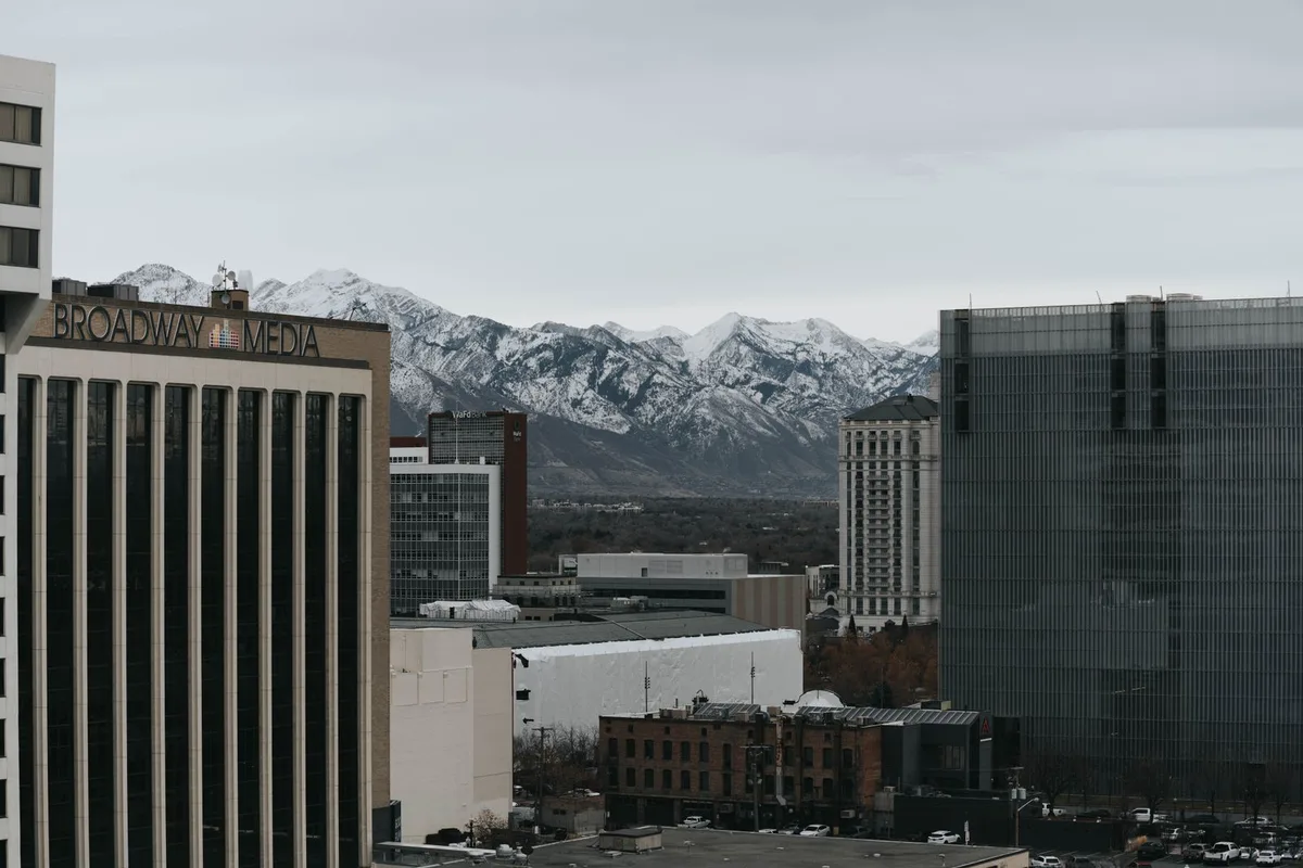 Downtown Salt Lake City beneath the snow-dusted Wasatch Range