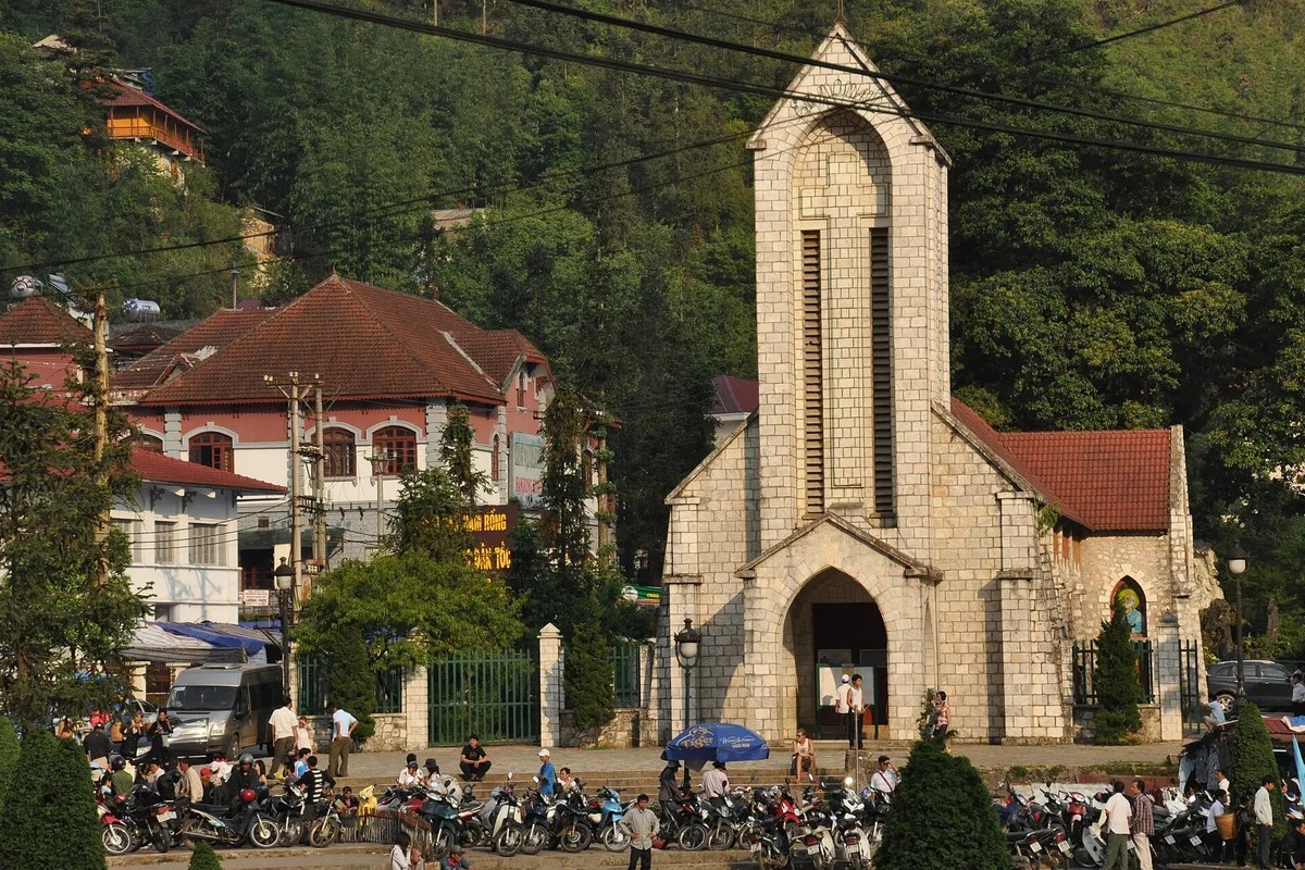 The stone church of Sapa, its bell tower above the town square