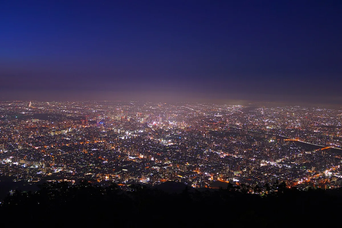 Sapporo's city lights at night seen from the Mt Moiwa observatory