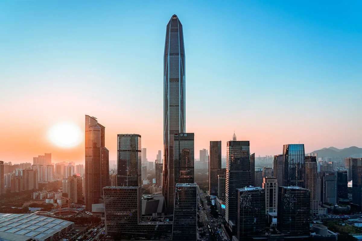The Ping An Finance Centre rising over Futian at sunset, Shenzhen
