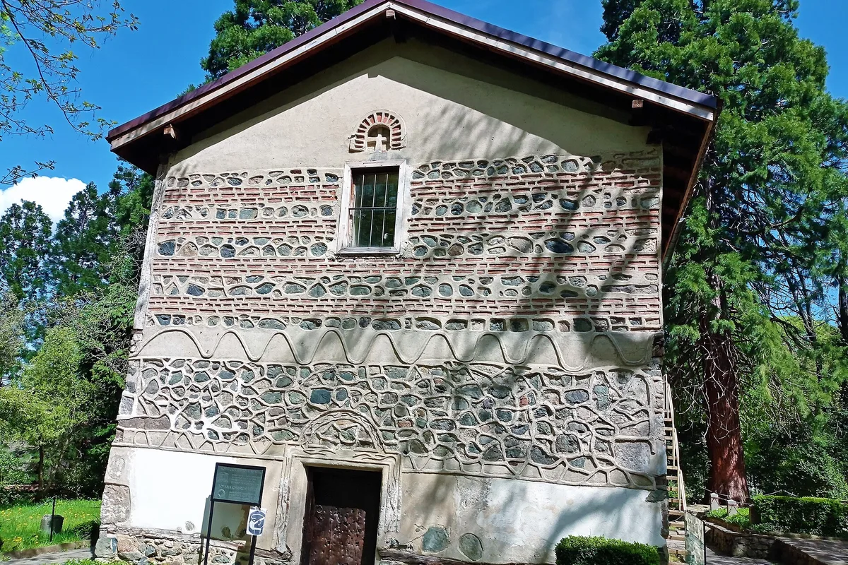 The stone and brick facade of the medieval Boyana Church, at the foot of Vitosha