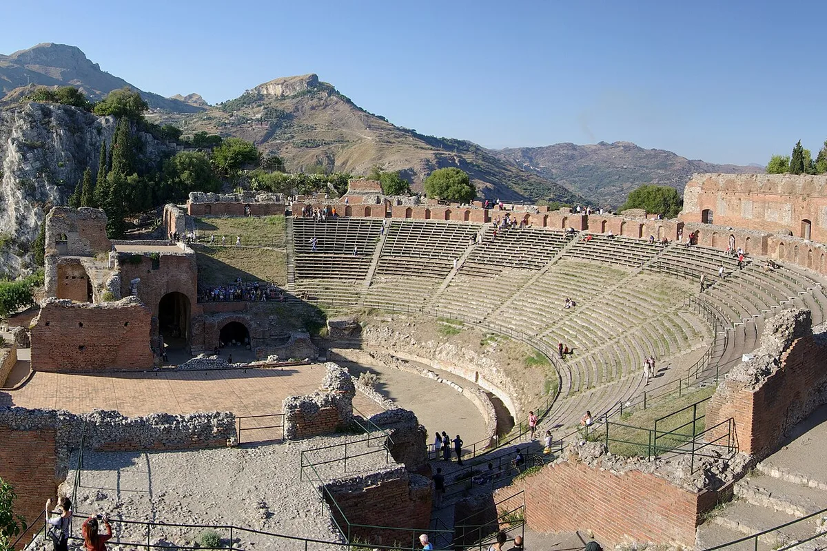 The Teatro Antico at Taormina, its cavea facing the Ionian Sea and Mount Etna