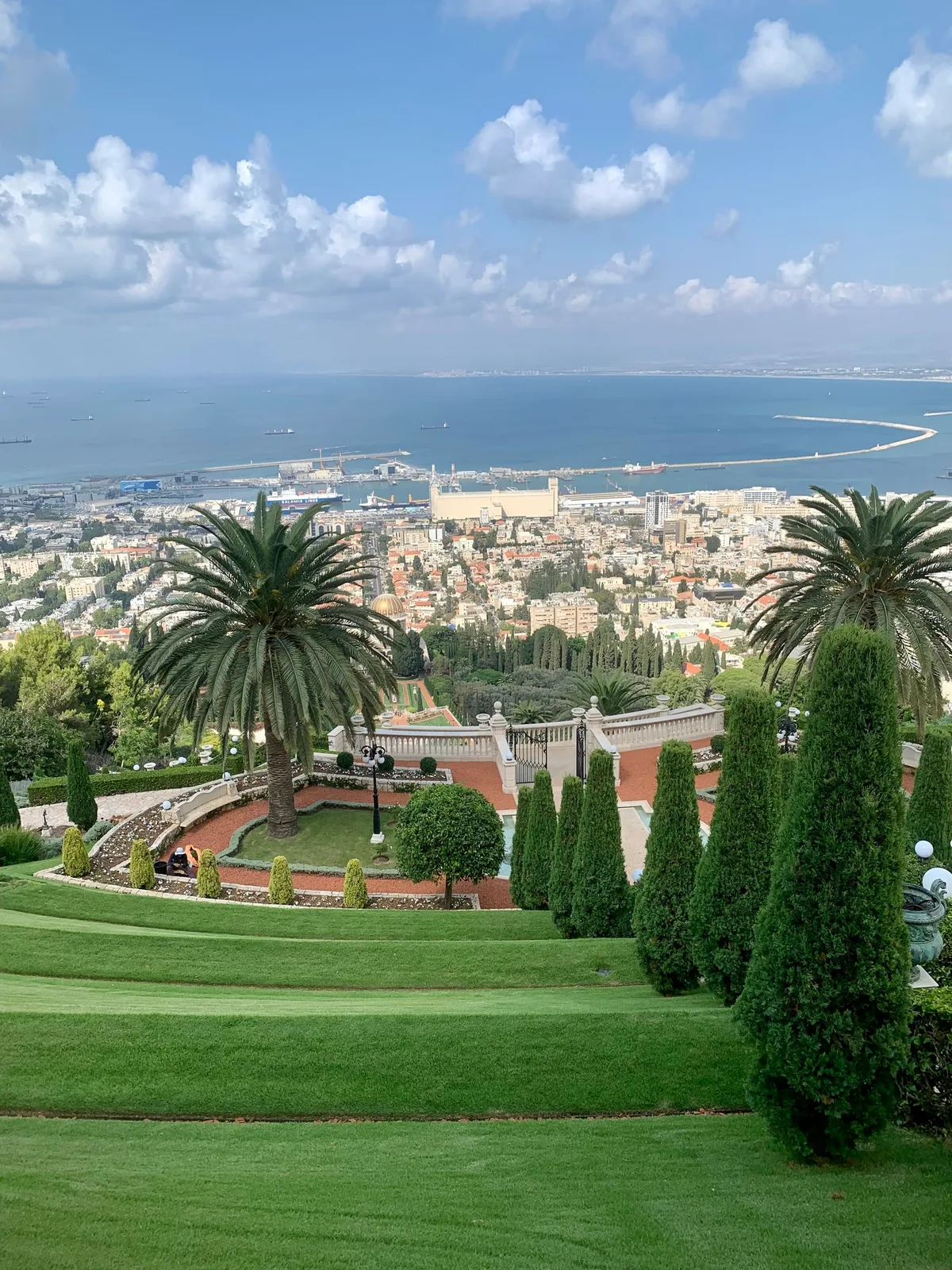 The Baháʼí terraces over Haifa port and the bay
