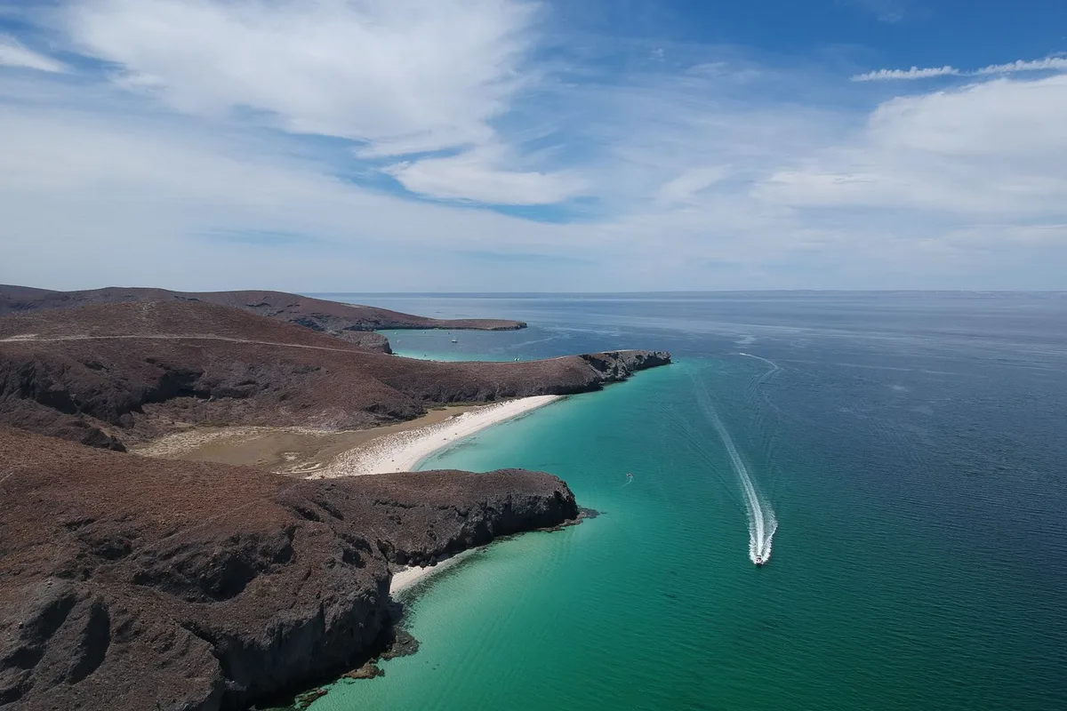 Balandra Beach from above, turquoise shallows around the mushroom rock bay