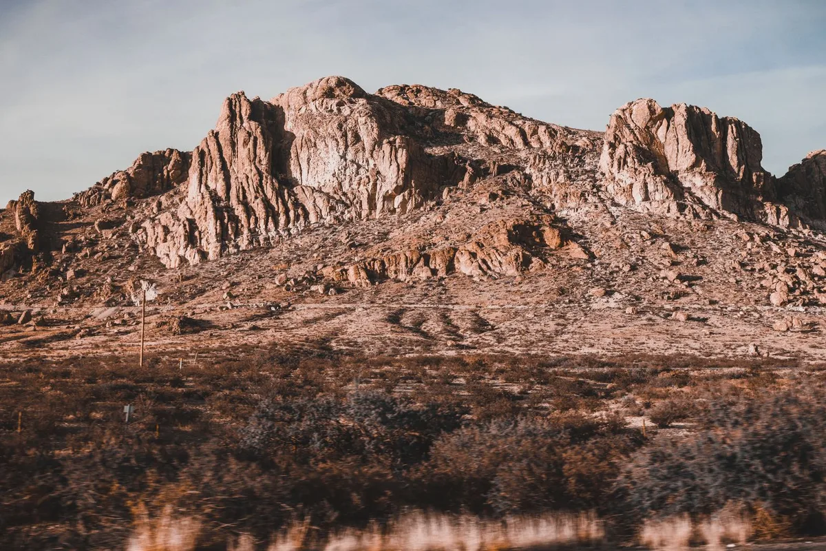 Red desert mountains above Baja California Sur scrubland
