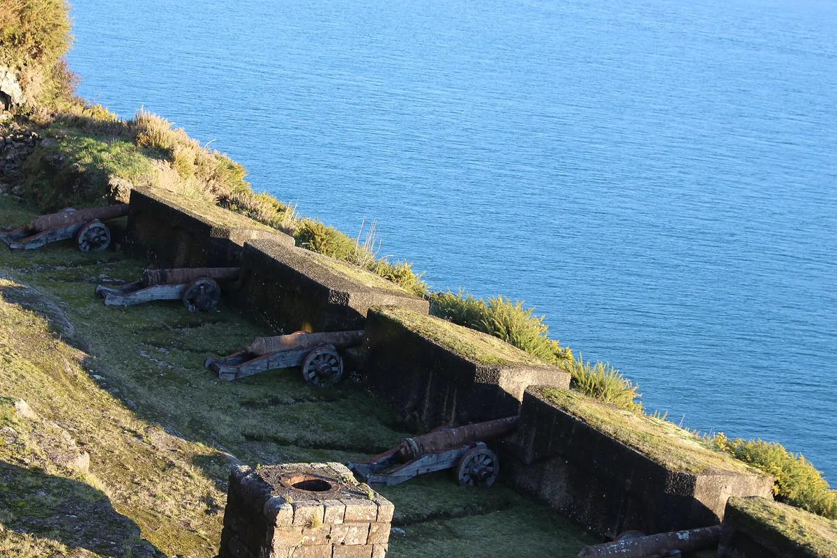Cannons along the bastion of the Castillo de Niebla, above the Pacific at the river mouth