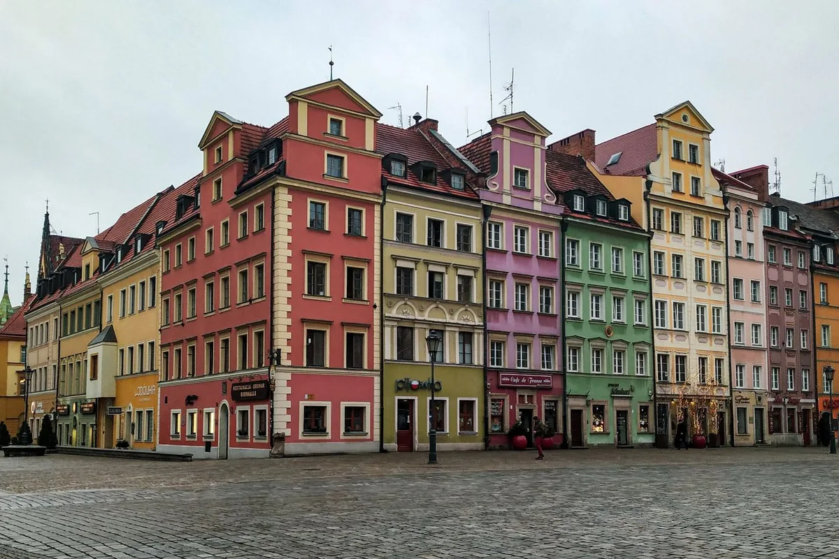 The painted tenements of Wrocław Market Square, the Rynek, in late afternoon light