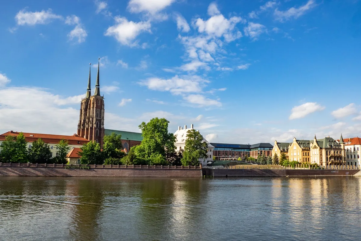 The twin spires of Wrocław Cathedral on Ostrów Tumski, seen across the Oder