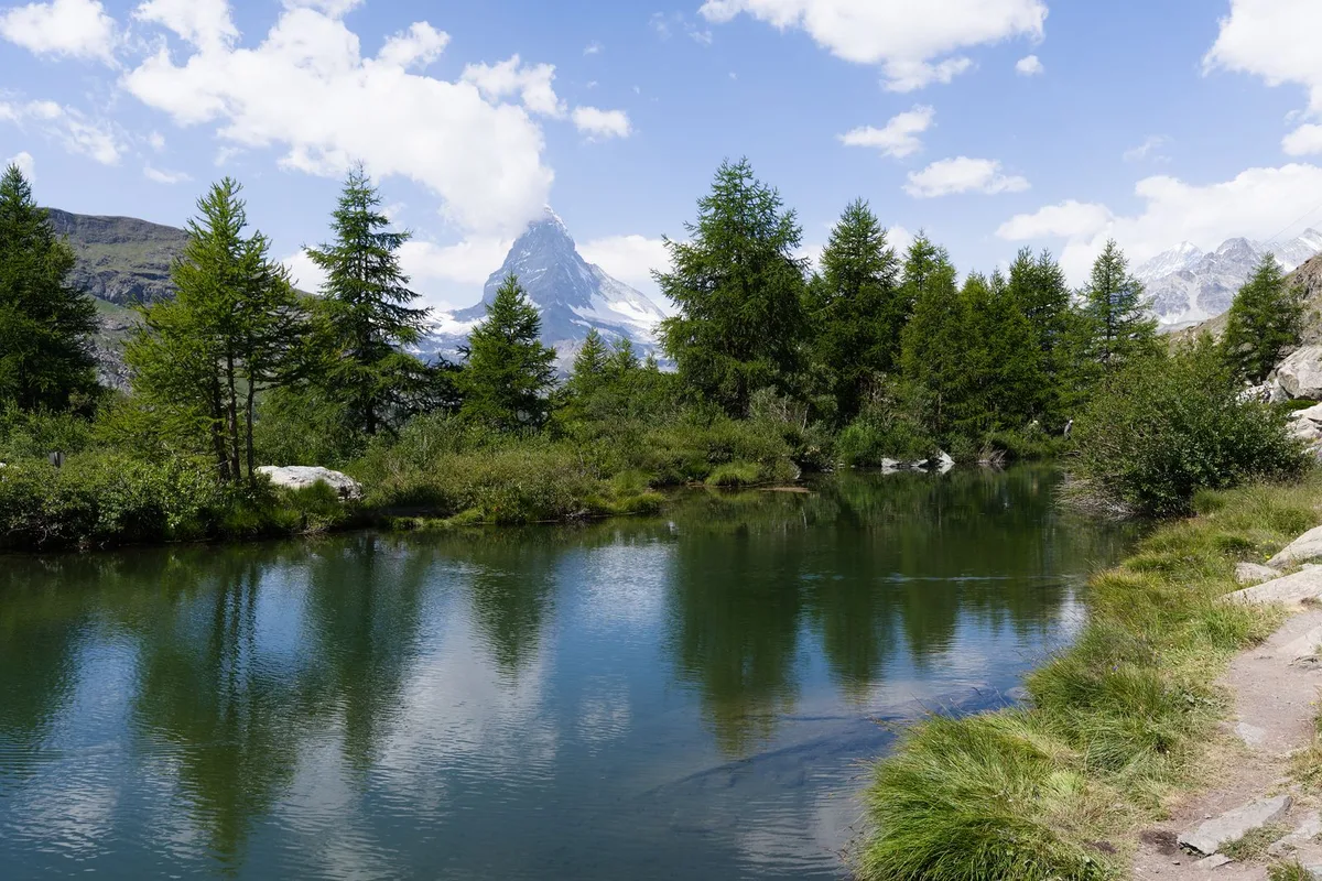 The Matterhorn reflected in an alpine lake